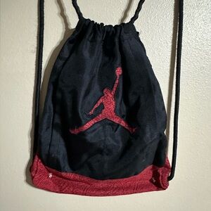 jordan black and red drawstring bag